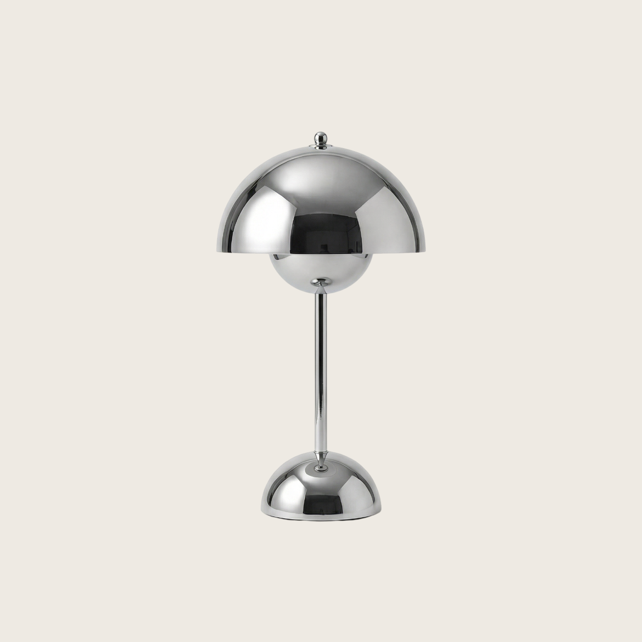 Chrome table lamp on a light gray background