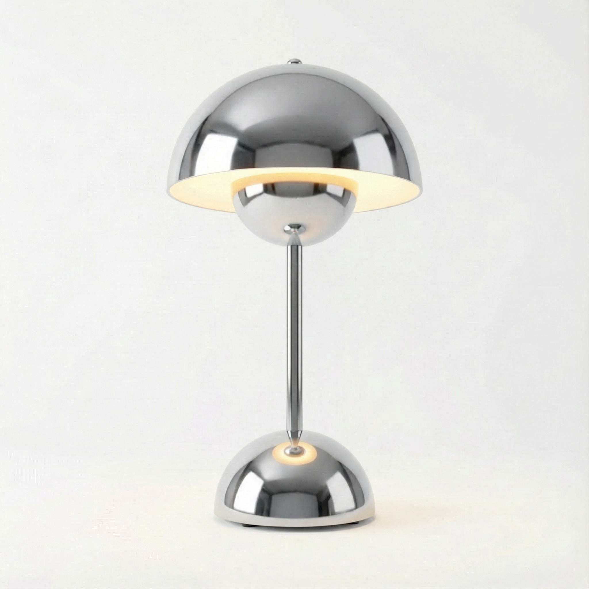 Modern chrome desk lamp on a white background